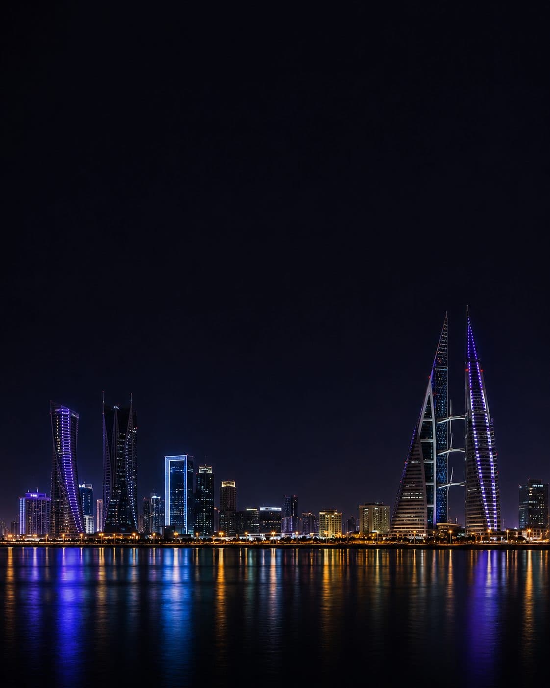 The Manama skyline at night, home of Webby